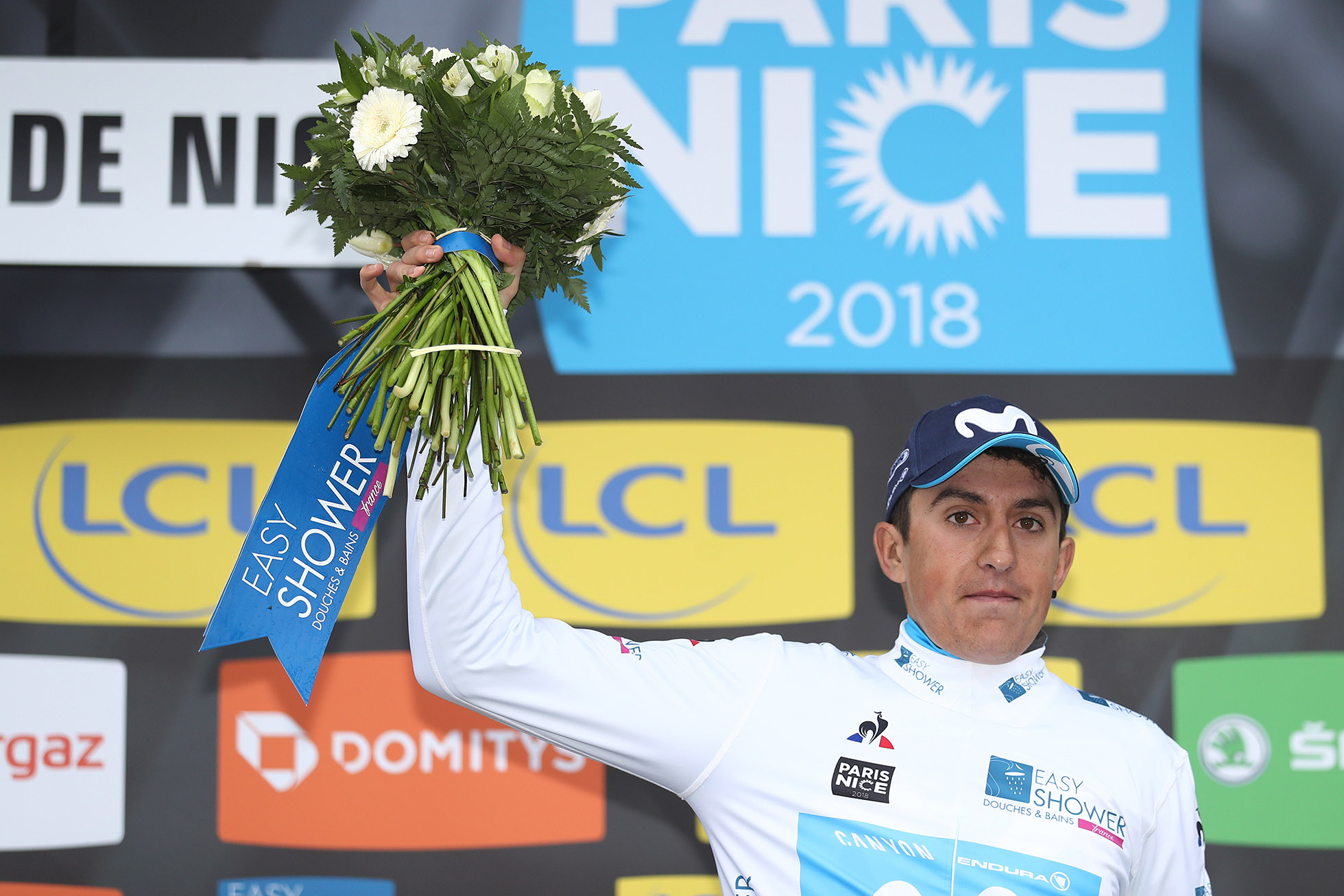 VALDEBLORE LA COLMIANE - MARCH 10: Podium / Marc Soler of Spain and Movistar Team White Best Young Rider / Celebration / Flowers / during the 76th Paris - Nice 2018 / Stage 7 a stage from Nice to Valdeblore La Colmiane 1500m on March 10, 2018 in Valdeblore La Colmiane, France. (Photo by Bryn Lennon/Getty Images)