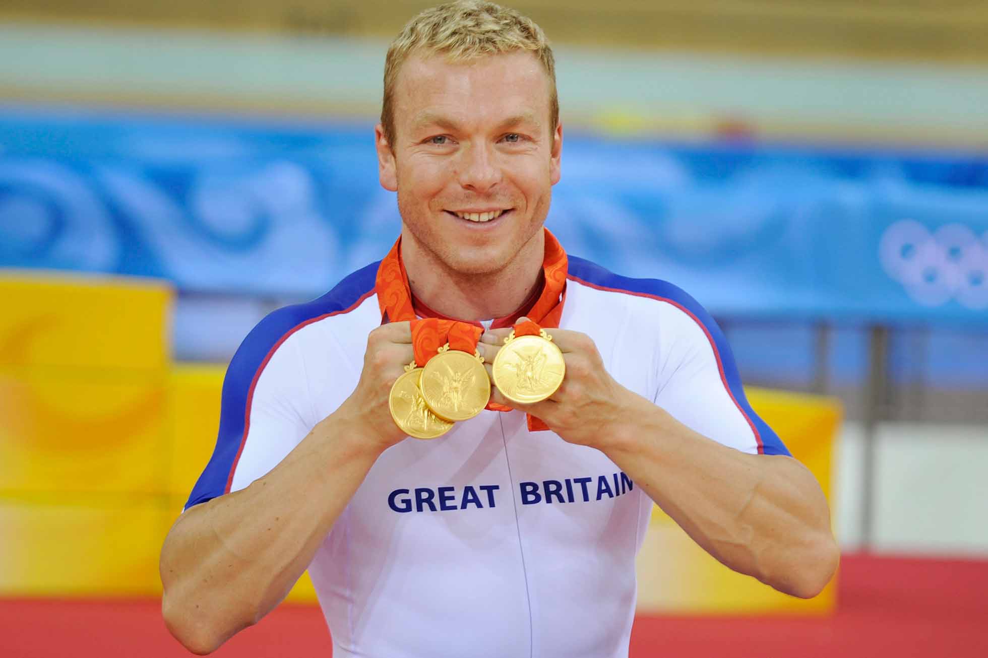 Chris Hoy (GBR) with the three gold medals he won in cycling at the games at the Summer Olympic Games in Beijing China 19th August 2008. (Photo by David Ashdown/Getty Images)