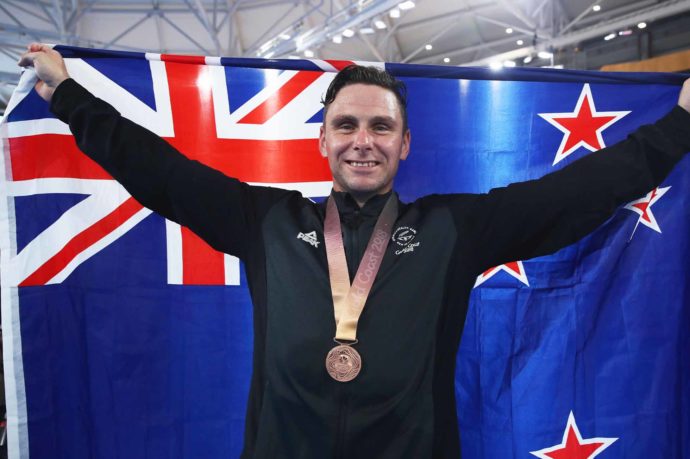 BRISBANE, AUSTRALIA - APRIL 06: Bronze medalist Edward Dawkins of New Zealand celebrates during the medal ceremony for the Men's Keirin Finals on day two of the Gold Coast 2018 Commonwealth Games at Anna Meares Velodrome on April 6, 2018 in Brisbane, Australia. (Photo by Scott Barbour/Getty Images)