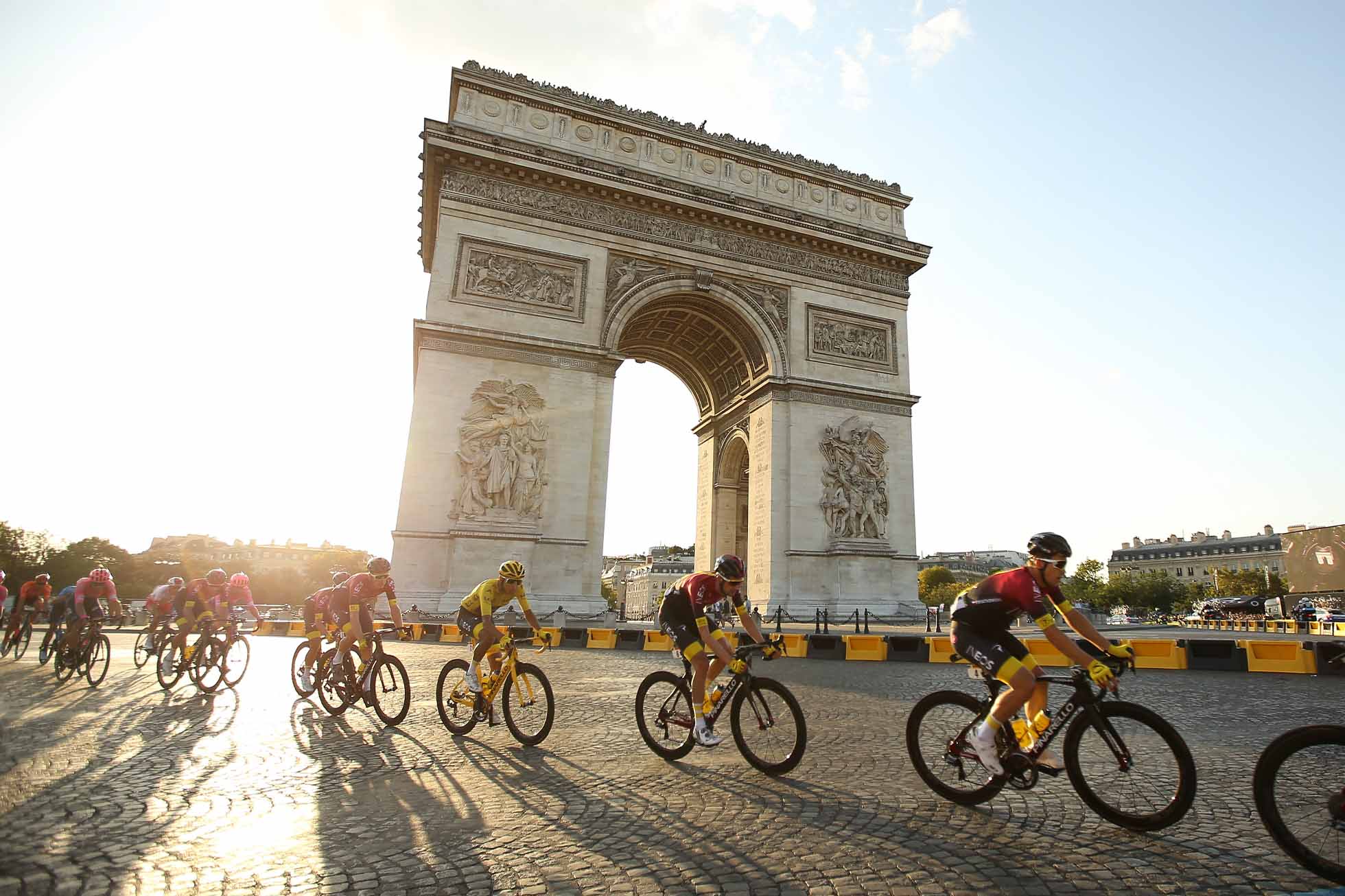 106th Tour de France 2019 - Stage 21 PARIS, FRANCE - JULY 28: Yellow jersey Egan Bernal Gomez of Colombia and Team Ineos passes with the pack in front of Arch of Triumph (Arc de Triomphe) at the top of Avenue des Champs Elysees during stage 21 of the 106th Tour de France 2019, the last stage from Rambouillet to Paris - Champs Elysees (128km) on July 28, 2019 in Paris, France. (Photo by Jean Catuffe/Getty Images)