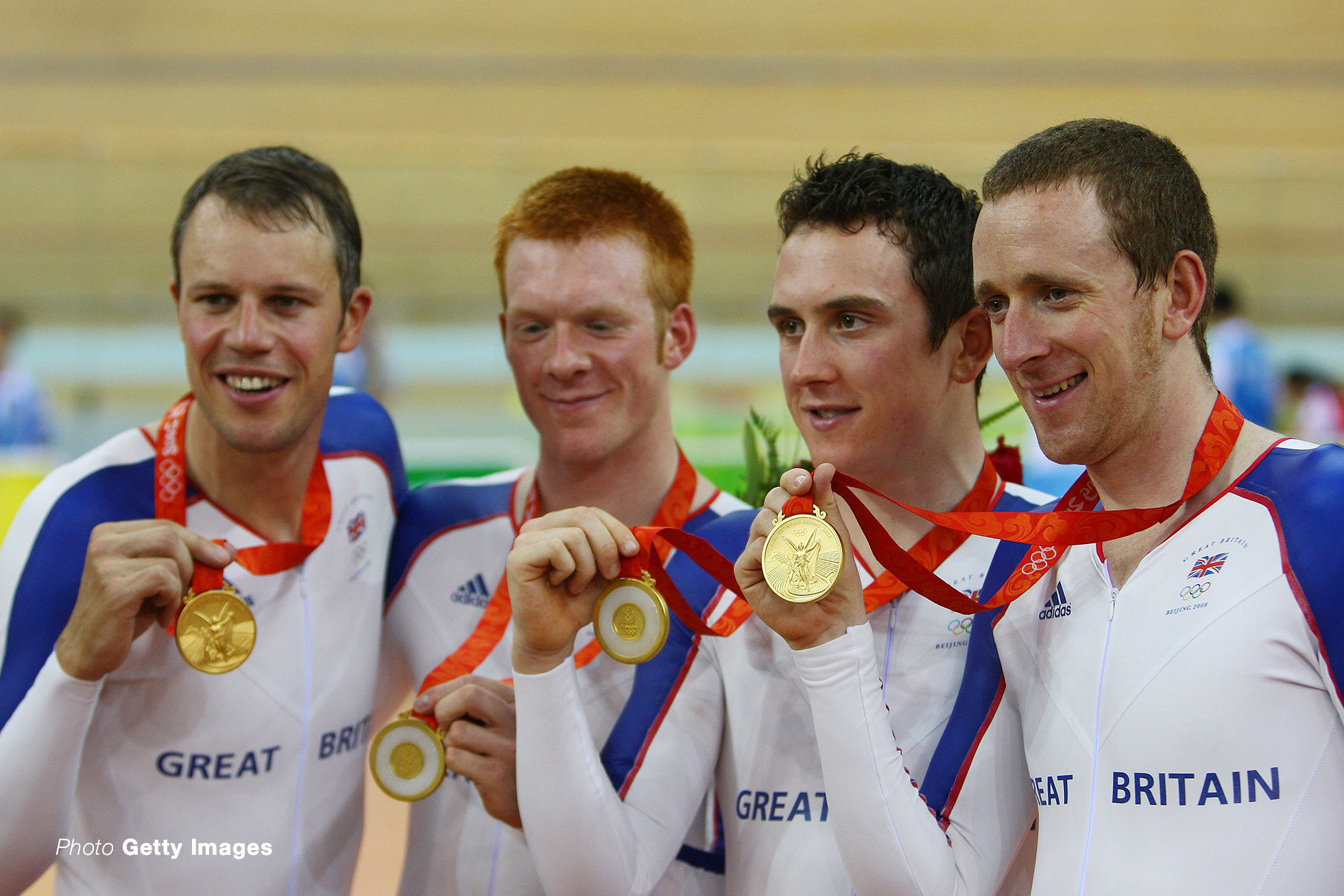 BEIJING - AUGUST 18: Gold medalists Paul Manning, Ed Clancy, Geraint Thomas and Bradley Wiggins of Great Britain celebrate after the Men's Team Pursuit Finals at the Laoshan Velodrome on Day 10 of the Beijing 2008 Olympic Games on August 18, 2008 in Beijing, China. (Photo by Mike Hewitt/Getty Images)