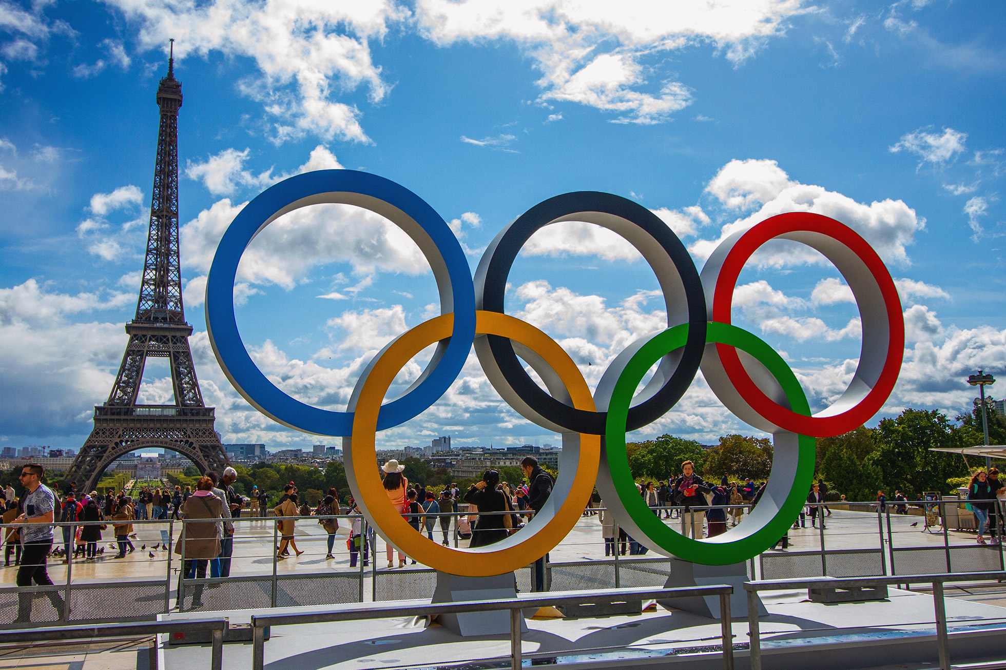 The Olympic Rings being placed in front of the Eiffel Tower