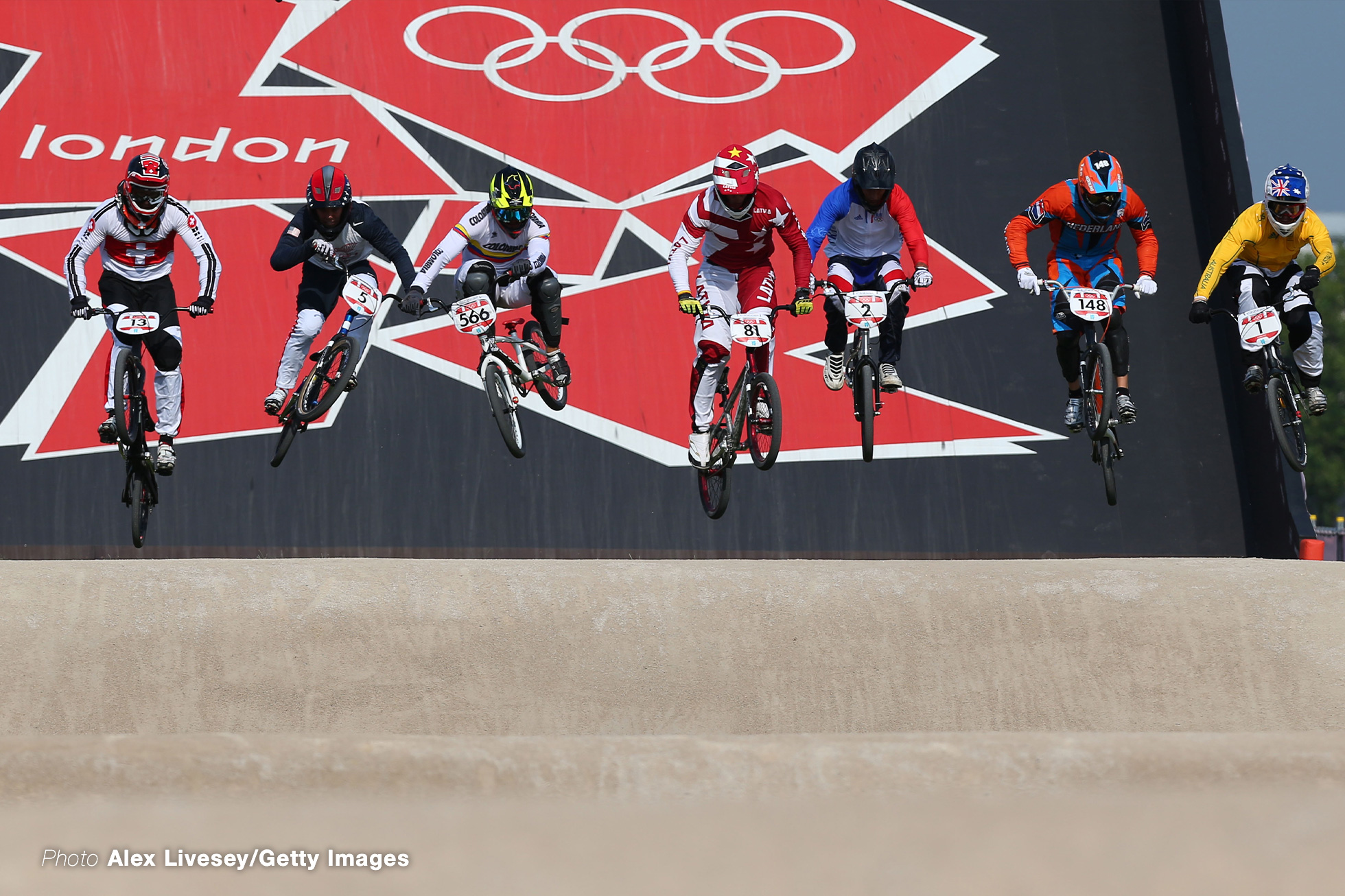 LONDON, ENGLAND - AUGUST 10: The field race down the starting ramp in the Men's BMX Cycling Final on Day 14 of the London 2012 Olympic Games at the BMX Track on August 10, 2012 in London, England. (Photo by Alex Livesey/Getty Images)