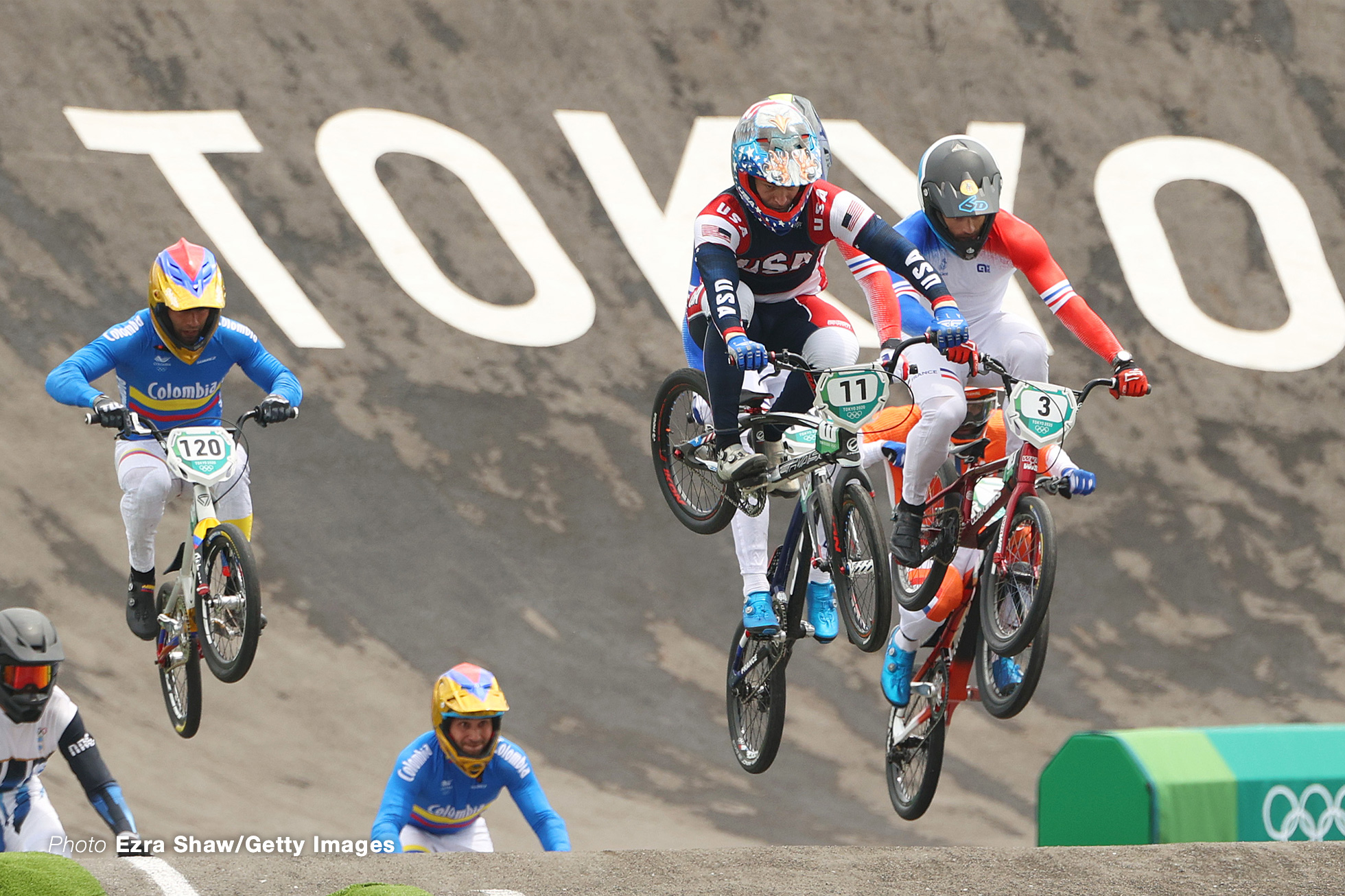 TOKYO, JAPAN - JULY 30: (L-R) Vincent Pelluard of Team Colombia, Connor Fields of Team United States and Sylvain Andre of Team France as they jump during the Men's BMX semifinal heat 1, run 2 on day seven of the Tokyo 2020 Olympic Games at Ariake Urban Sports Park on July 30, 2021 in Tokyo, Japan. (Photo by Ezra Shaw/Getty Images)