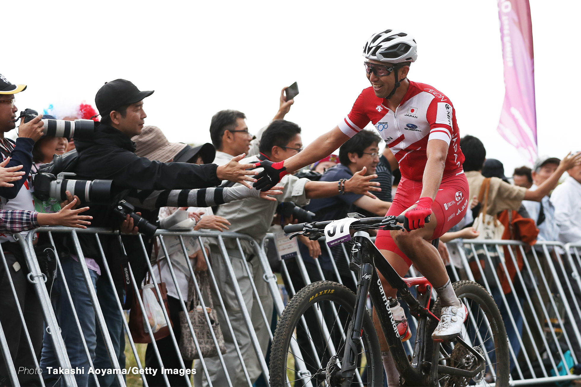 IZU, JAPAN - OCTOBER 06: Kohei Yamamoto of Japan celebrates at the finish during the Cycling - Mountain Bike Tokyo 2020 Test Event on October 06, 2019 in Izu, Shizuoka, Japan. (Photo by Takashi Aoyama/Getty Images)