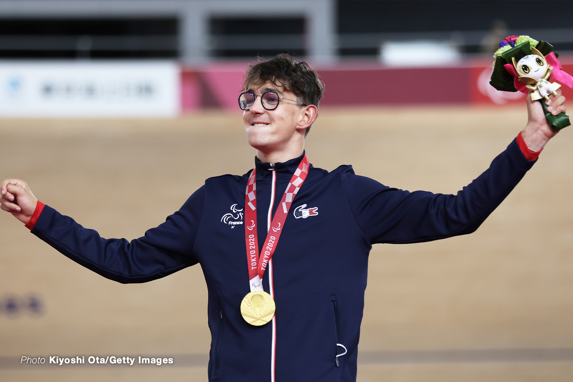 IZU, JAPAN - AUGUST 26: Gold medalist Alexandre Leaute of Team France celebrates on the podium during the medal ceremony for the Track Cycling Men's C2 3000m Individual Pursuit Final on day 2 of the Tokyo 2020 Paralympic Games at Izu Velodrome on August 26, 2021 in Izu, Shizuoka, Japan. (Photo by Kiyoshi Ota/Getty Images)