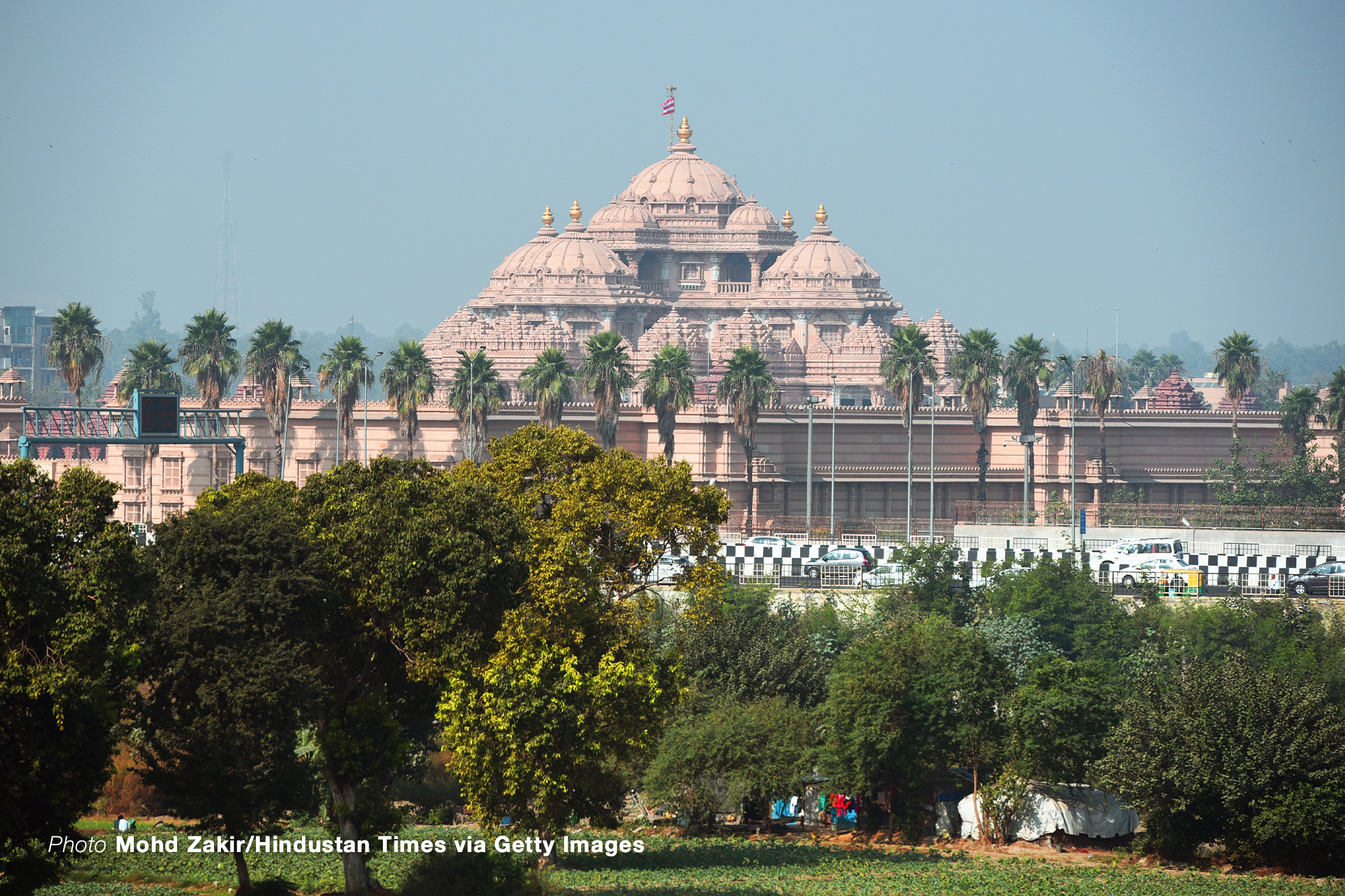 NEW DELHI, INDIA - NOVEMBER 6: A view of the Akshardham Temple on November 6, 2018 in New Delhi, India. Contrasting a foggy chill on Monday, the city began Tuesday with a sunny outlook, the air seemingly a notch clearer but still in the very poor category when AQI is between 300 and 400. (Photo by Mohd Zakir/Hindustan Times via Getty Images)