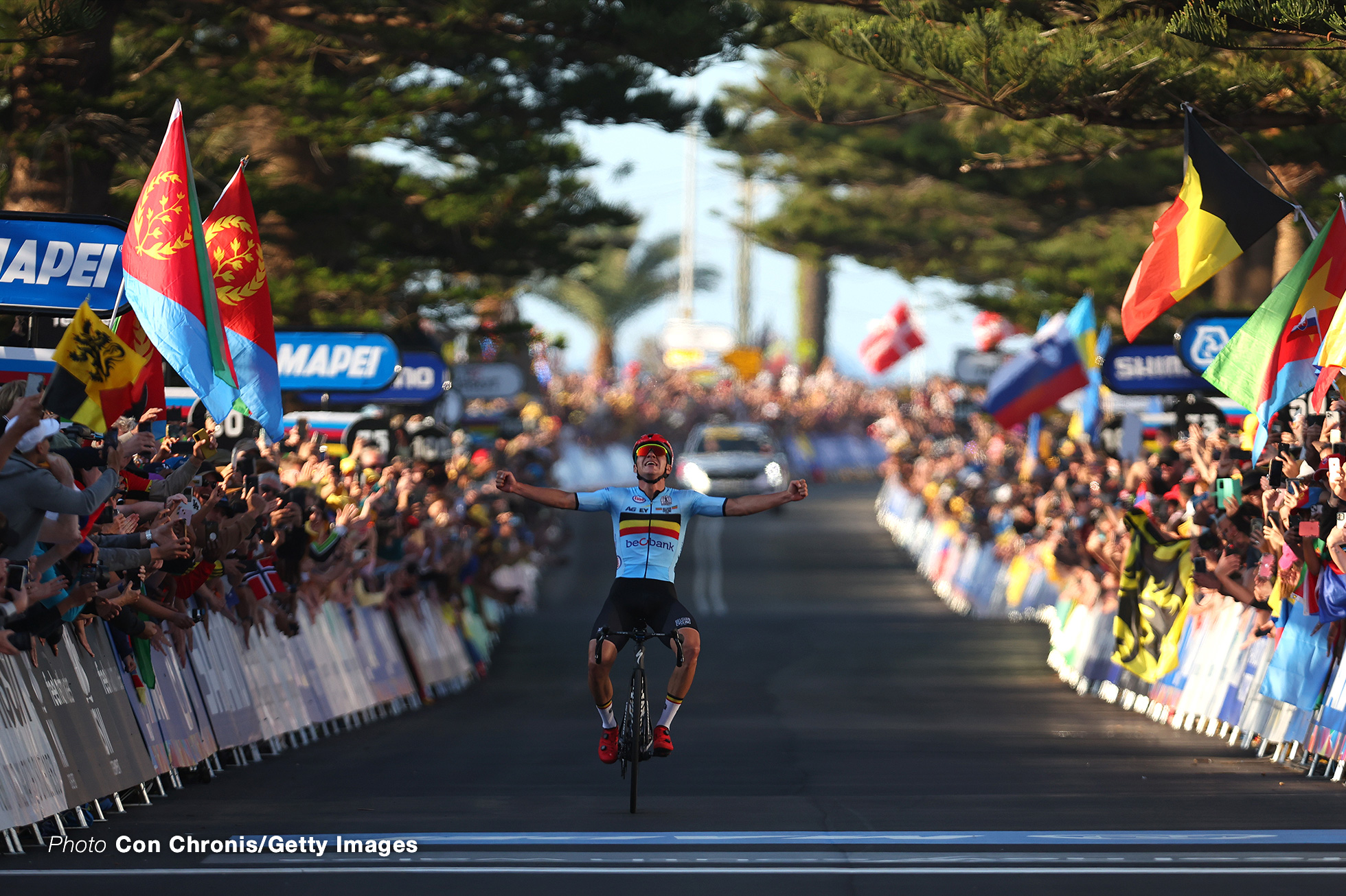 WOLLONGONG, AUSTRALIA - SEPTEMBER 25: Remco Evenepoel of Belgium celebrates at finish line as race winner during the 95th UCI Road World Championships 2022, Men Elite Road Race a 266,9km race from Helensburgh to Wollongong / #Wollongong2022 / on September 25, 2022 in Wollongong, Australia. (Photo by Con Chronis/Getty Images)