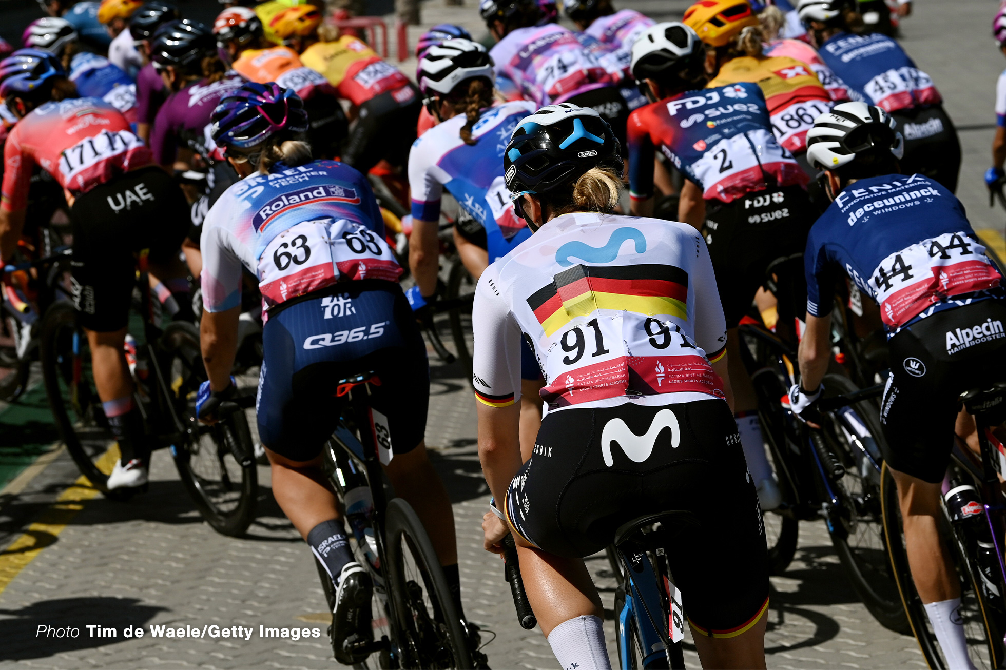 DUBAI, UNITED ARAB EMIRATES - FEBRUARY 09: Detailed view of Tamara Dronova-Balabolina of Russia and Team Israel Premier Tech Roland, Liane Lippert of Germany and Movistar Team and Petra Stiasny of Switzerland and Team Fenix-Deceuninck compete during the 1st UAE Tour Women 2023, Stage 1 a 109km stage from Port Rashid to Dubai Harbour / #UAETourWomen / on February 09, 2023 in Dubai, United Arab Emirates. (Photo by Tim de Waele/Getty Images)