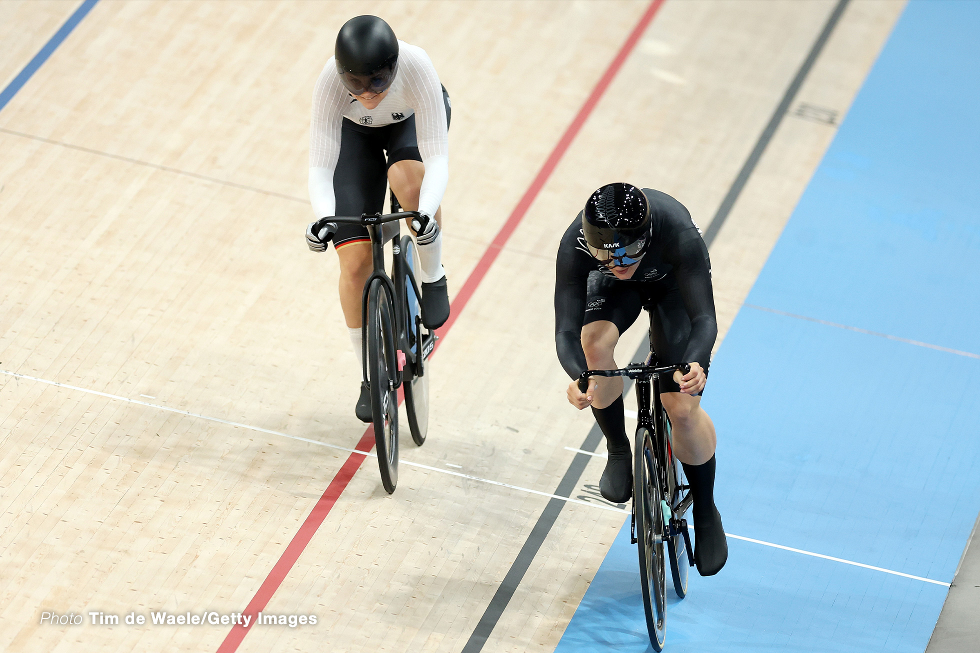 PARIS, FRANCE - AUGUST 11: (L-R) Lea Friedrich of Team Germany and sprint winner Ellesse Andrews of Team New Zealand compete during the Women's Sprint, Finals - Race 1 on day sixteen of the Olympic Games Paris 2024 at Saint-Quentin-en-Yvelines Velodrome on August 11, 2024 in Paris, France. (Photo by Tim de Waele/Getty Images)