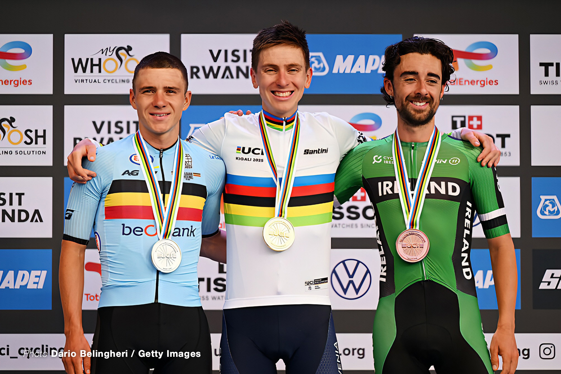 Silver medalist Remco Evenepoel and Team Belgium, gold medalist Tadej Pogacar and Team Slovenia and bronze medalist Ben Healy and Team Ireland pose on the podium during the medal ceremony after the 98th UCI Cycling World Championships Kigali 2025, Men Elite Road Race a 267.5km race from Kigali to Kigali on September 28, 2025 in Kigali, Rwanda. (Photo by Dario Belingheri/Getty Images)