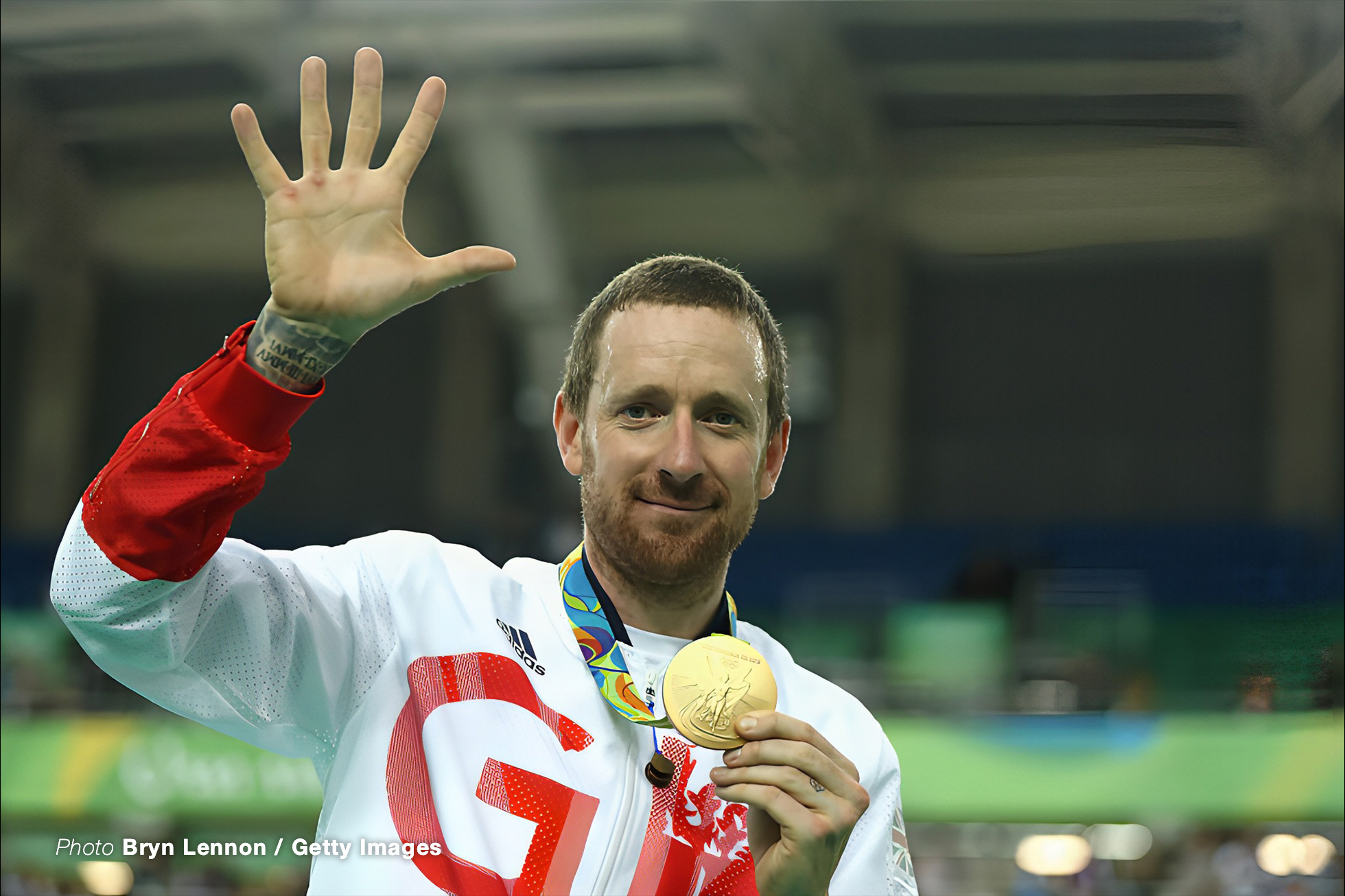 RIO DE JANEIRO, BRAZIL - AUGUST 12: Gold medalist Bradley Wiggins of Team Great Britain poses for photographs with his fifth gold medal in his career after at the medal ceremony for the Men's Team Pursuit on Day 7 of the Rio 2016 Olympic Games at the Rio Olympic Velodrome on August 12, 2016 in Rio de Janeiro, Brazil. (Photo by Bryn Lennon/Getty Images)